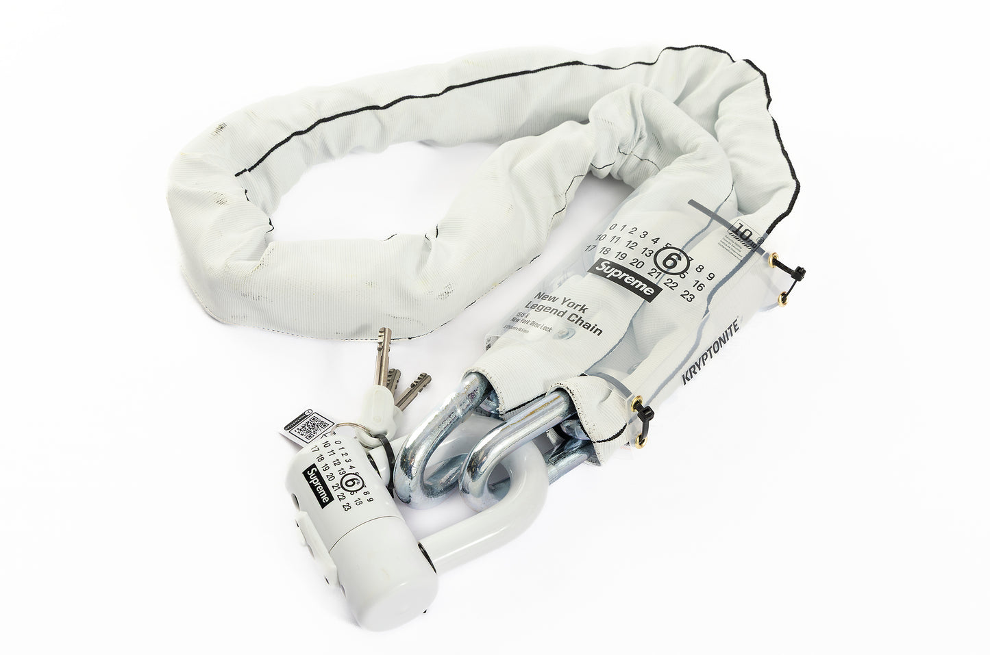 White bike lock with key on a white background