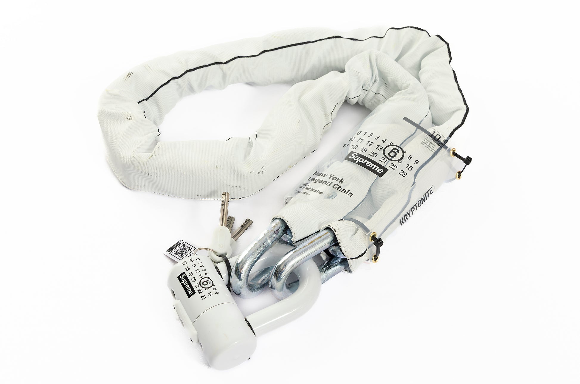 White bike lock with key on a white background