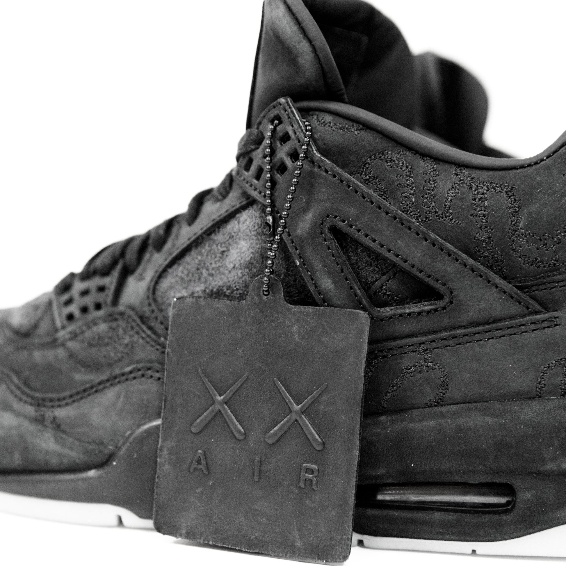 Kaws x Jordan Retro 4 Black - supergl0rious
